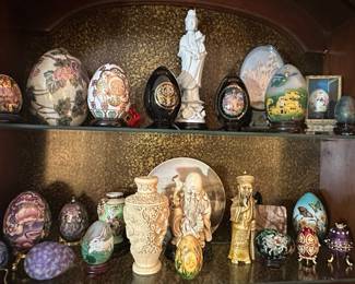 Collection of Decorative Eggs and Asian Figurines