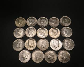 Lot 51. Nineteen 40% Kennedy Half Dollars