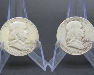 Lot 323. Two Franklin Half Dollars