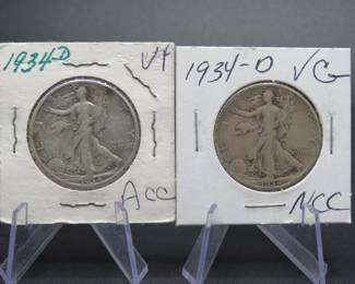 Lot 256. Two 1934 D Walking Liberty Half Dollars