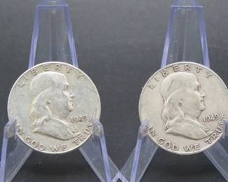 Lot 329. Two Franklin Half Dollars