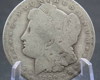 Lot 244. 1899 O Morgan Silver Dollar