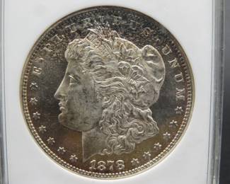 Lot 147. 1878 S Morgan Silver Dollar slabbed and graded MS 63 by ANACS