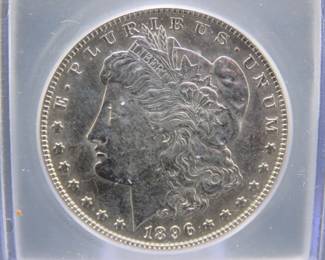 Lot 233. 1896 P Morgan Silver Dollar slabbed and graded AU 58 by ICG