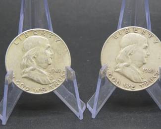 Lot 327. Two Franklin Half Dollars