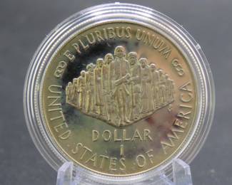 Lot 200. U.S. Constitution Coins:1987 .900 pure gold $5 coin weighing .2687 troy ounces. 1987 90% Silver Dollar. Only 5% Buyer's Premium!