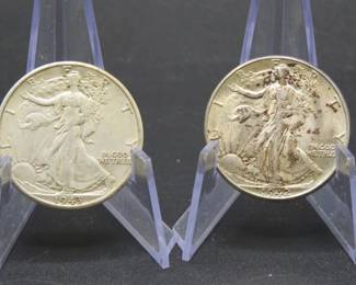 Lot 355. Two Walking Liberty Half Dollars
