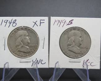 Lot 305. Two Franklin Half Dollars dates as pictured