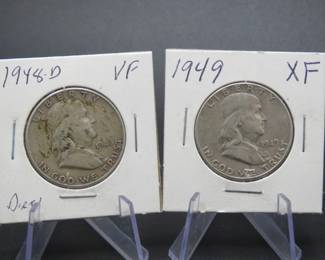 Lot 300. Two Franklin Half Dollars dates as pictured