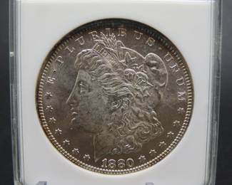 Lot 146. 1880 P Morgan Silver Dollar slabbed and graded MS 63 by ANACS
