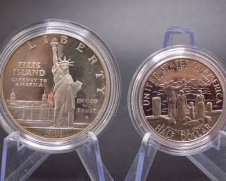 Lot 53. 1986 U.S. Liberty 90% (.77 troy ounce) Silver Dollar and a clad Half Dollar