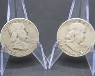 Lot 196. Two Franklin Half Dollars