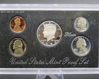 Lot 269. 1992 S Silver Proof set with 90% Silver Dime, Quarter, and Half Dollar.