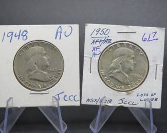 Lot 303. Two Franklin Half Dollars dates as pictured