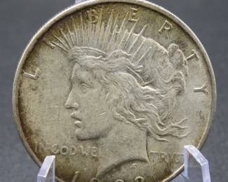 Lot 223. 1922 P Peace Silver Dollar with toning