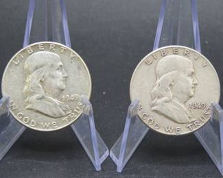 Lot 322. Two Franklin Half Dollars