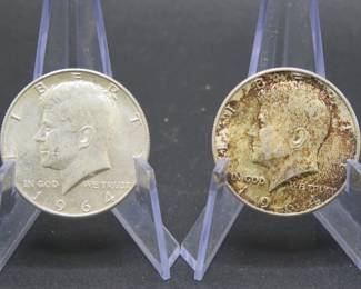 Lot 295. Two 1964 Kennedy Half Dollars