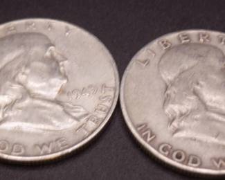 Lot 15. Two Franklin Half Dollars
