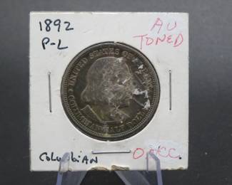 Lot 265. 1893 Columbian Exposition 90% Silver Half Dollar with .36169 ounce silver weight