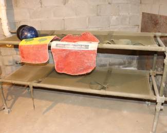 Vintage Military Cots, Burlap Advertisement Sacks, Bowling Balls