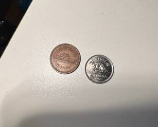 Japanese Yen Coin and Canadian Cent Coin