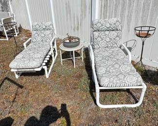 White PVC Pipe Frame Chaise Lounges with Floral Cushions Set of 