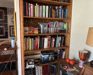 Wooden Bookshelf with Assorted Books and Decor