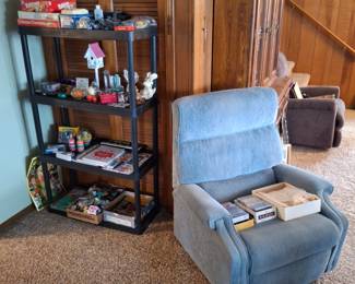 Blue Recliner and a Shelf Full of Toys and Knick Knacks!