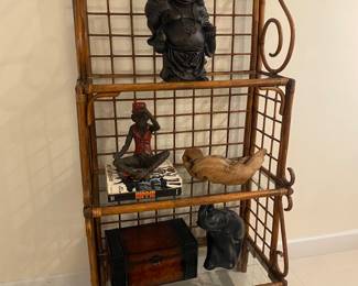 Bakers rack rattan 
Budha sculpture 
Burlwood box 
Wood decor 
Monkey not available 