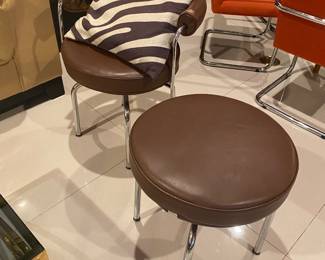 Chrome swivel armchair w stool 