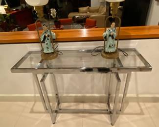 Chrome console /buffet 
Pair of Asian sculpture art deco 