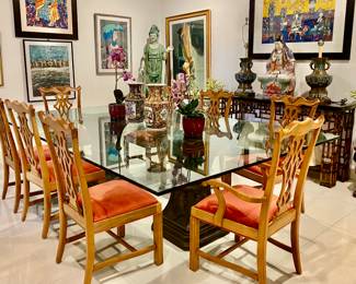 8 Chippendale dining chairs 
Very large glass top dining table w bases 
Asian decorative vases pots and stand available. 
Glass top dinig table large 
Large lamps and lady sculpture in console not available 