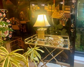 Gold bamboo tray table w mirror top 
Lucite lamps w gold (2) 
4 panel asian screen 