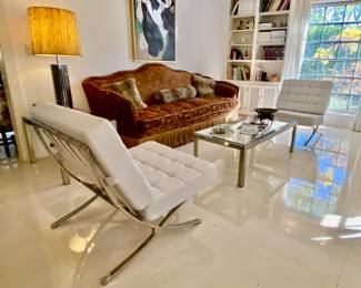 2nd home …
2 Barcelona chairs 
Italian table set chrome w glass top 
Midcentury chrome lamp 
Large art 
Large custom made sofá w fringes 
Art 
Custom made large sofá 
Art print 