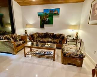 Wicker sofa 
Wicker armchair 
Wicker ottoman w cushion 
Rattan coffee table 
Glass lamps 
Cuban art 
French art 
