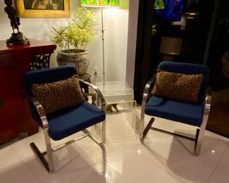 Pair of Midcentury chrome armchairs 
Acrylic nesting tables 
Antique stain glass floor lamp 
Asian plant pot 