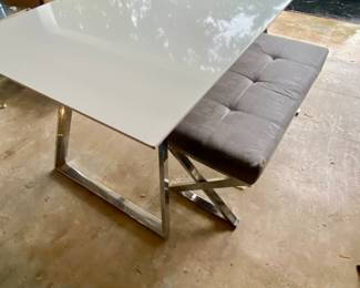 2nd home … 
White dining table w chrome base and bench 