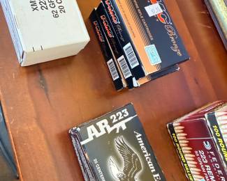 American Eagle AR .223 ammunition and assorted ammo boxes