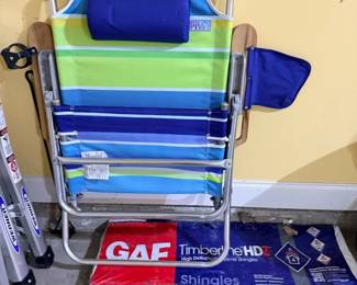 Folding beach chairs, blue and green striped