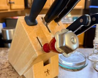 Kitchen knife set in wood block with sharpener