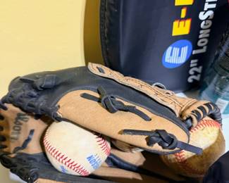 Baseball glove with baseball