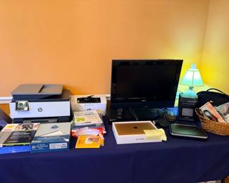 HP printer, computer monitor, desk lamp, office supplies