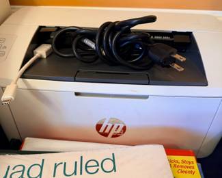 HP printer scanner with office paper and supplies
