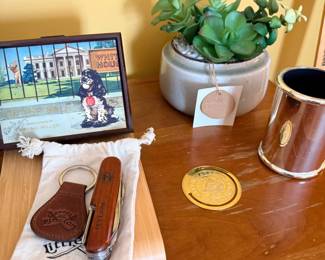 Assorted collectibles, framed photo, coin, succulent planter