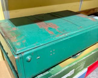 Vintage green metal tool box with patina