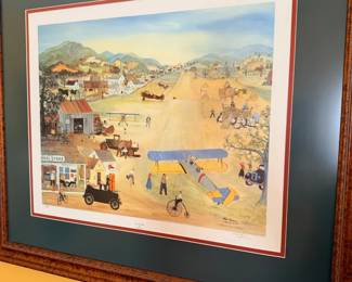 Framed folk art print, vintage town scene with old cars
