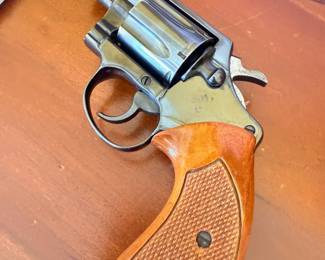 Stainless steel revolver with wood grips