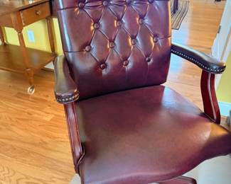 Burgundy tufted leather executive office chair, wood arms