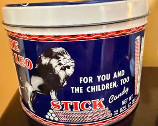 Vintage Leo Stick Candy advertising tin