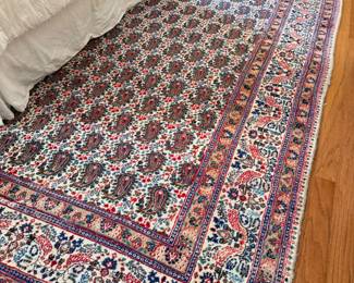Persian-style area rug, detailed all-over pattern, red and blue